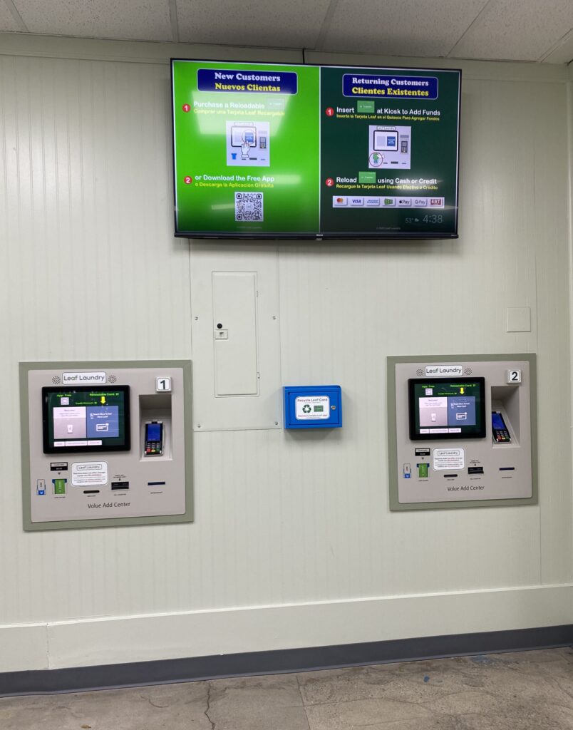 Payment Kiosks with instructions on TV screen above